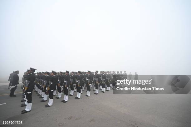 Amid zero visibility thick fog blankets, Indian coast guard personnel rehearse for the upcoming Republic Day parade, at Vijay Chowk, on January 14,...