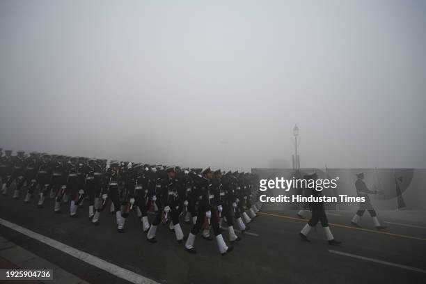 Amid zero visibility thick fog blankets Indian coast guard personnel rehearsals for the upcoming Republic Day parade, at Vijay Chowk, on January 14,...