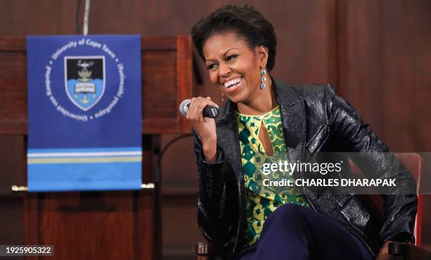 First lady Michelle Obama reacts to a student's question at the University of Cape Town in Cape Town, South Africa on June 23, 2011. AFP...