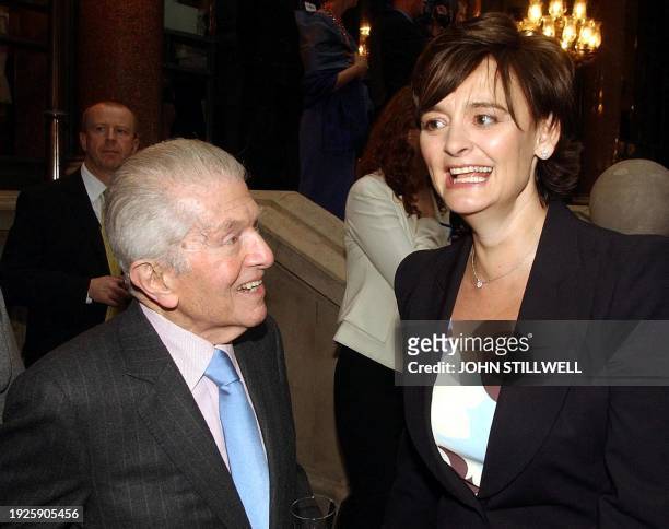 British Prime Minister's wife Cherie Blair talks to Egon Ronay during the EU enlargement: Unification of Europe - VIP Party, to celebrate the entry...