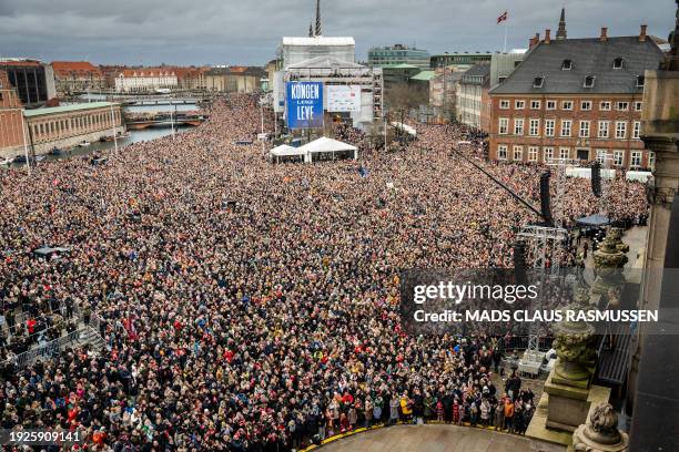 King Frederik X of Denmark looks towards the crowd from the balcony of Christiansborg Palace in Copenhagen, Denmark on January 14 after a declaration...
