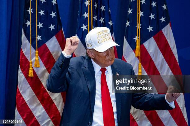 Former US President Donald Trump dances during a campaign event at Simpson College in Indianola, Iowa, US, on Sunday, Jan. 14, 2024. Trump heads into...