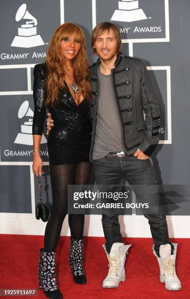 French DJ David Guetta and his wife Cathy arrive on the red carpet at the 52nd Grammy Awards in Los Angeles on January 31, 2010. AFP PHOTO/Gabriel...