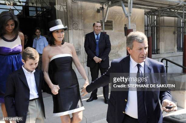 Cecilia Ciganer-Albeniz, aka the former Cecilia Sarkozy , her husband Richard Attias , Louis , son of Cecilia and French President Nicolas Sarkozy,...