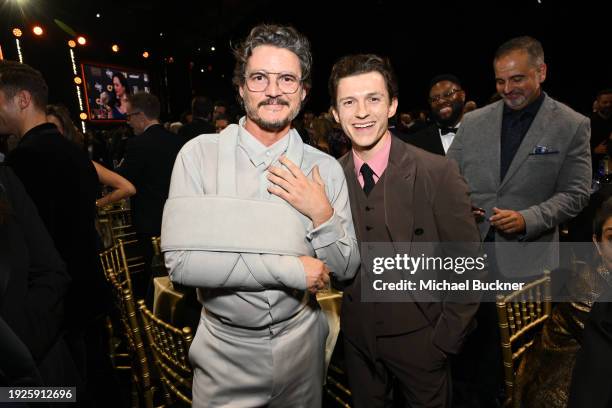 Pedro Pascal and Tom Holland at The 29th Critics' Choice Awards held at The Barker Hangar on January 14, 2024 in Santa Monica, California.