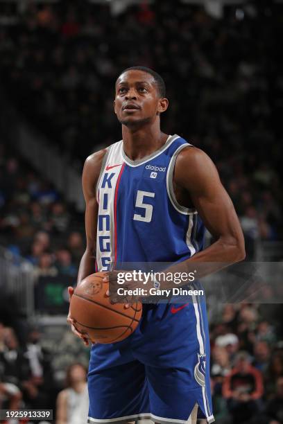 De'Aaron Fox of the Sacramento Kings shoots free throw during the game against the Milwaukee Bucks on January 14, 2024 at the Fiserv Forum Center in...