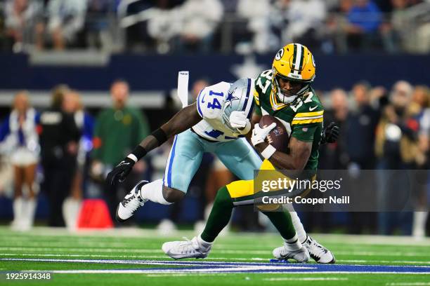 Romeo Doubs of the Green Bay Packers runs with the ball against the Dallas Cowboys during the first half of the NFC Wild Card playoff game at AT&T...