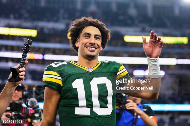 Jordan Love of the Green Bay Packers celebrates after defeating the Dallas Cowboys during the NFC Wild Card playoff game at AT&T Stadium on January...