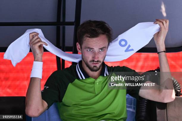 Russia's Daniil Medvedev keeps cool during a break in his men's singles match against France's Terence Atmane on day two of the Australian Open...