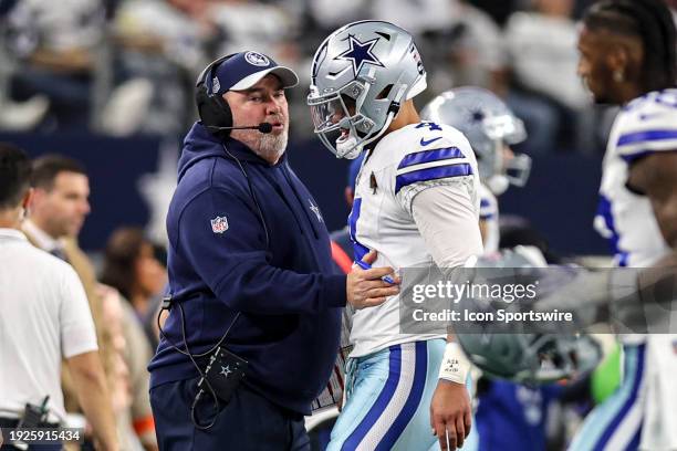 Dallas Cowboys head coach Mike McCarthy talks to quarterback Dak Prescott after an interception during the NFC Wild Card game between the Dallas...