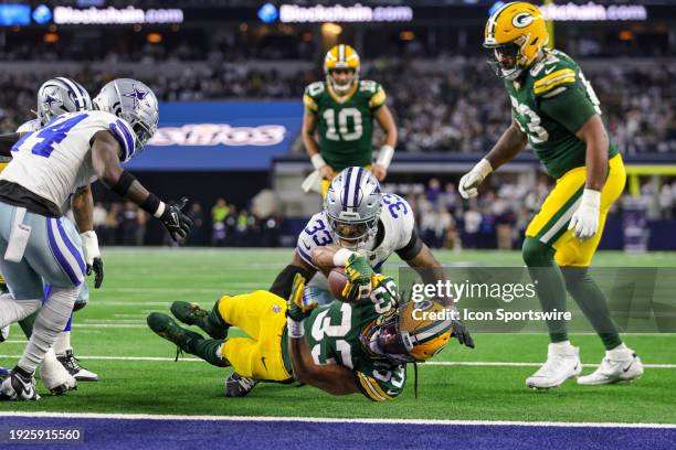 Green Bay Packers running back Aaron Jones scores a touchdown during the NFC Wild Card game between the Dallas Cowboys and the Green Bay Packers on...