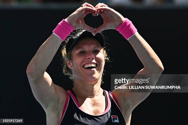 Germany's Laura Siegemund celebrates after victory against Russia's Ekaterina Alexandrova during their women's singles match on day two of the...