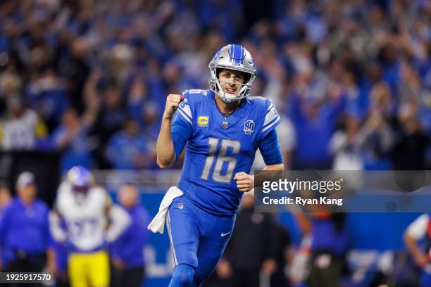 Jared Goff of the Detroit Lions celebrates after the team scored a touchdown during an NFL wild-card playoff football game against the Los Angeles...