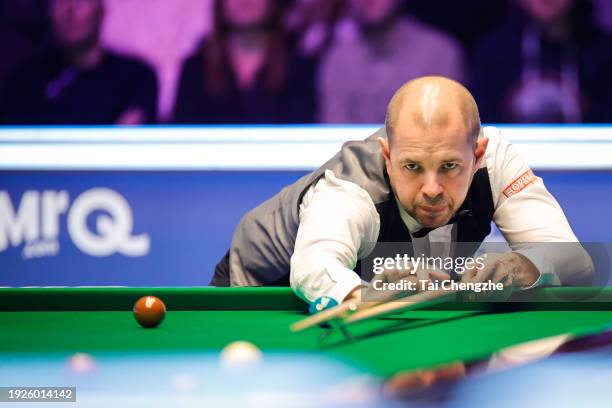 Barry Hawkins of England plays a shot in the quarter-final match against Ronnie O'Sullivan of England on day 5 of the 2024 MrQ Masters Snooker at...