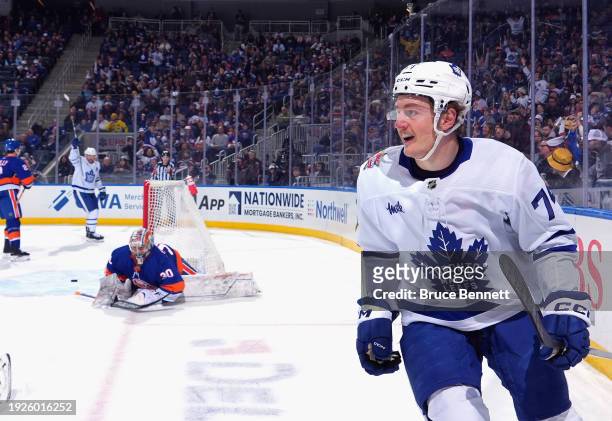 Bobby McMann of the Toronto Maple Leafs scores against Ilya Sorokin of the New York Islanders at 12:38 of the first period at UBS Arena on January...