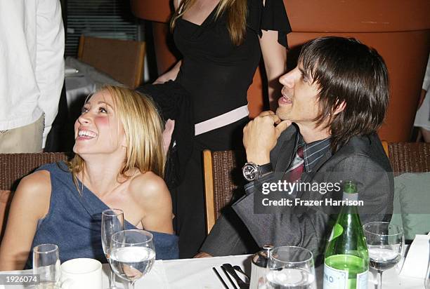 Michelle Dupont girlfriend of Adrien Brody with singer Anthony Kiedis at Ian Schrager's Mondrian Hotel where a post Oscar and birthday party was held...