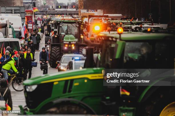 Road blockades are pictured during the demonstration of the farmers on January 15, 2024 in Berlin, Germany. Thousands of farmers protest against the...