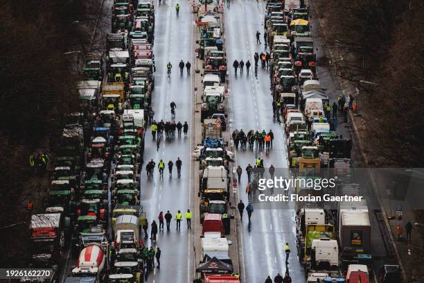 Road blockades are pictured during the demonstration of the farmers on January 15, 2024 in Berlin, Germany. Thousands of farmers protest against the...