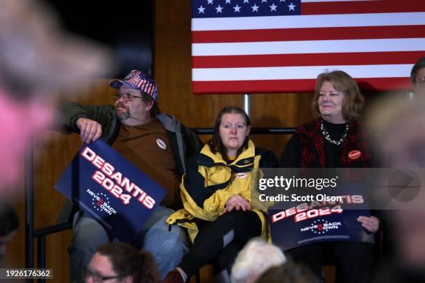 Supporters of Republican presidential candidate Florida Governor Ron DeSantis attend a campaign event at Jethro's BBQ on January 11, 2024 in Ames,...