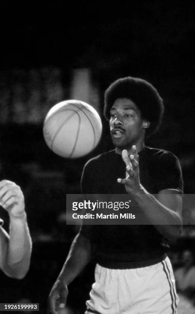Player of the Philadelphia 76ers, Julius Erving, receives the ball during the 3 on 3 Celebrity Basketball Tournament at the Las Vegas Hilton Showroom...