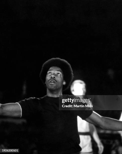 Player of the Philadelphia 76ers, Julius Erving, shoots the ball underhanded during the 3 on 3 Celebrity Basketball Tournament at the Las Vegas...