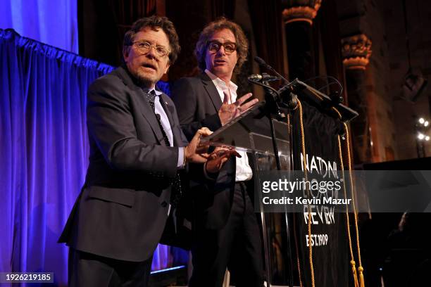 Michael J. Fox and Davis Guggenheim accept the Best Documentary award for "Still: A Michael J. Fox Movie" onstage during the National Board Of Review...