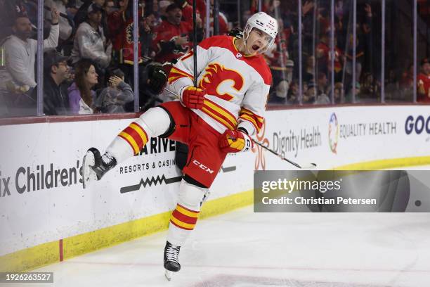 Yegor Sharangovich of the Calgary Flames celebrates after scoring a a short-handed goal against the Arizona Coyotes during the first period of the...