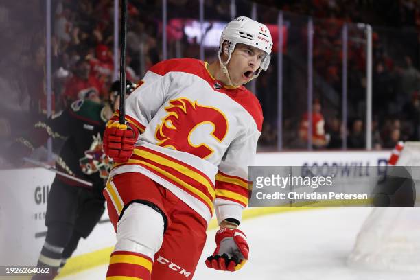 Yegor Sharangovich of the Calgary Flames celebrates after scoring a a short-handed goal against the Arizona Coyotes during the first period of the...