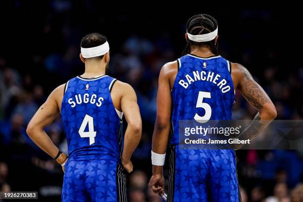 Jalen Suggs and Paolo Banchero of the Orlando Magic look on during the first half of a game against the Atlanta Hawks at the Kia Center on January...