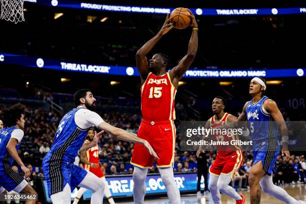 Clint Capela of the Atlanta Hawks shoots the ball against Goga Bitadze of the Orlando Magic during the first half of a game at the Kia Center on...