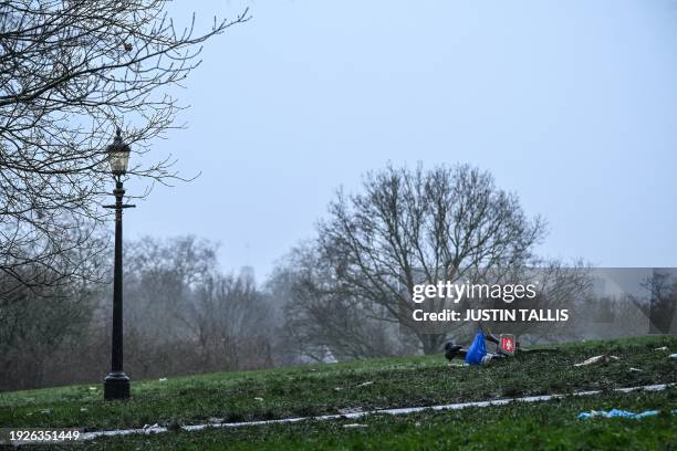 Photograph taken on January 2, 2024 shows a discarded bicycle, on Primrose Hill, north London, where on December 31 16-year-old Harry Pitman was...