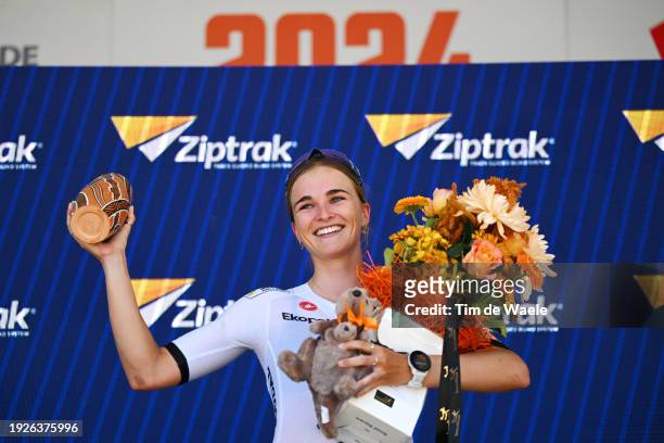 Ally Wollaston of New Zealand and AG Insurance - Soudal Team celebrates at podium as stage winner during the 8th Santos Women's Tour Down Under 2024,...