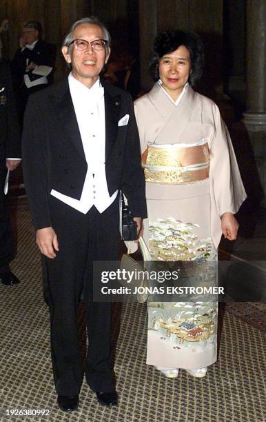 Nobel prize laureate in chemistry 2000, Japanese Professor Hideki Shirakawa arrives with his wife Shiyoko 11 December 2000, at the Stockholm Royal...