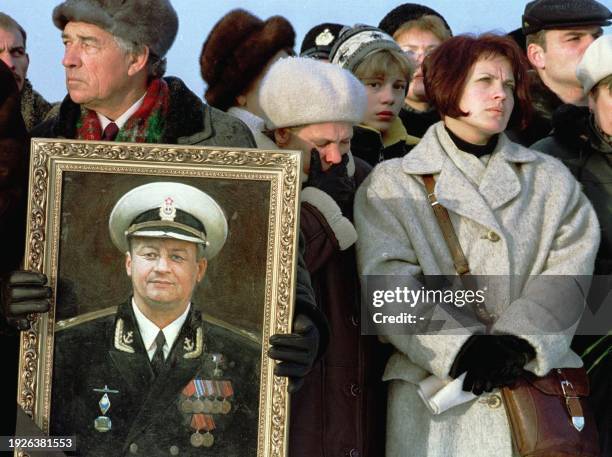 The widow of Lt Dmitry Kolesnikov, Olga, , mourns 29 October 2000 during a memorial ceremony for the crew of the sunken Russian nuclear submarine...