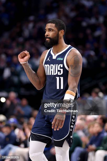 Kyrie Irving of the Dallas Mavericks reacts after a basket against the New York Knicks in the second half at American Airlines Center on January 11,...