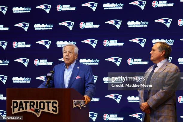 Owner Robert Kraft speaks to the media as head coach Bill Belichick of the New England Patriots looks on during a press conference at Gillette...