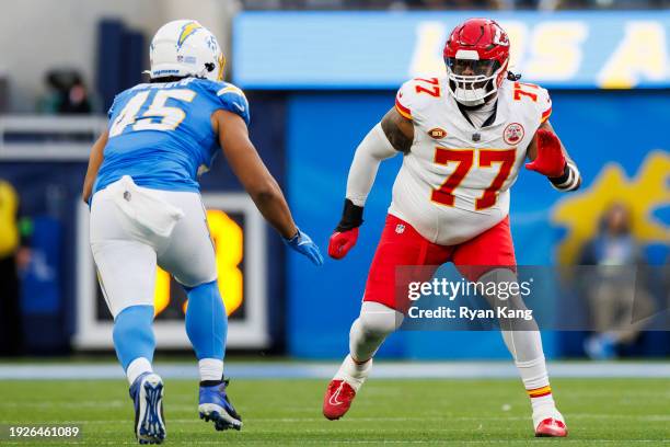 Lucas Niang of the Kansas City Chiefs blocks during an NFL football game against the Los Angeles Chargers at SoFi Stadium on January 7, 2024 in...