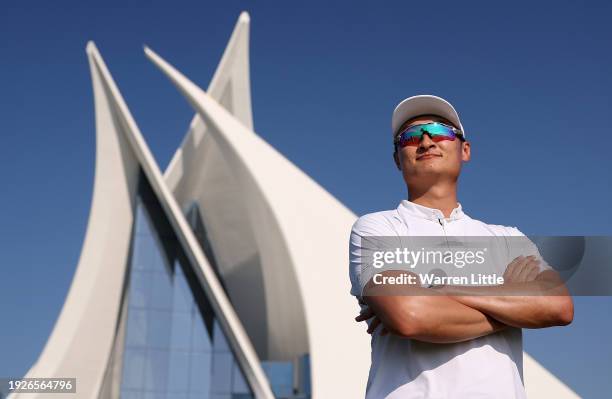 Haotong Li of China poses for a portrait on the 10th tee on Day Two of the Dubai Invitational at Dubai Creek Golf and Yacht Club on January 12, 2024...