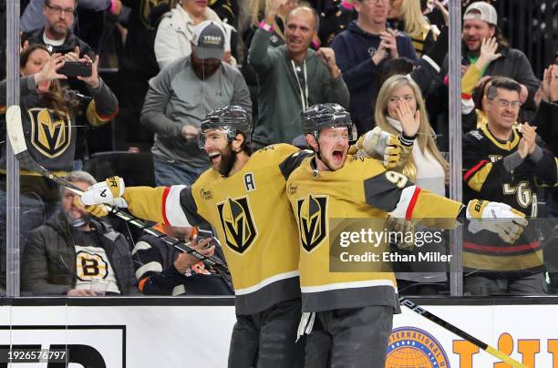 Alex Pietrangelo and Jack Eichel of the Vegas Golden Knights celebrate Pietrangelo's overtime goal against the Boston Bruins during their game at...