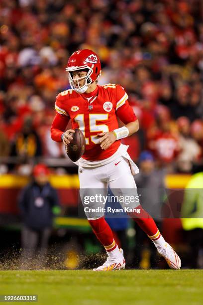 Patrick Mahomes of the Kansas City Chiefs drops back and looks to throw a pass during an NFL football game against the Buffalo Bills at GEHA Field at...