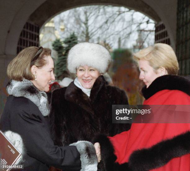 Wife of Canadian Prime Minister Aline Chretien shakes hands with Russian President's wife Lyudmila Putin during their visit at the Novodevichiy...