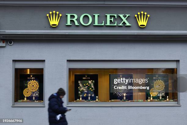 Pedestrian passes a Rolex SA luxury watch store on the promenade ahead of the World Economic Forum in Davos, Switzerland, on Monday, Jan. 15, 2024....