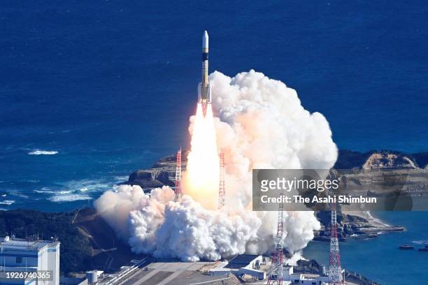 In this aerial image, the H-IIA launch vehicle No. 48 lifts off from the launch pad at JAXA Tanegashima Space Center on January 12, 2024 in...