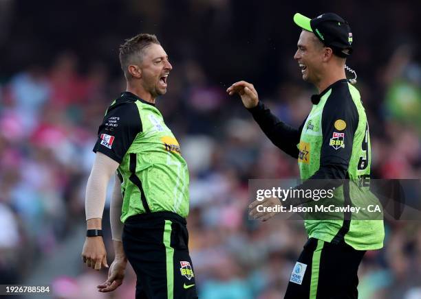 Daniel Sams of the Thunder celebrates after taking the wicket of Steve Smith of the Sixers during the BBL match between Sydney Sixers and Sydney...