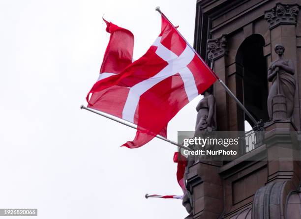 The Danish flag is flying on the tower of Christiansborg Palace in Copenhagen, Denmark, on January 14, 2024.