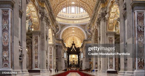 St. Peter's Baldachin, a large Baroque sculpted bronze canopy over the high altar of St. Peter's Basilica, designed by the Italian artist Gian...