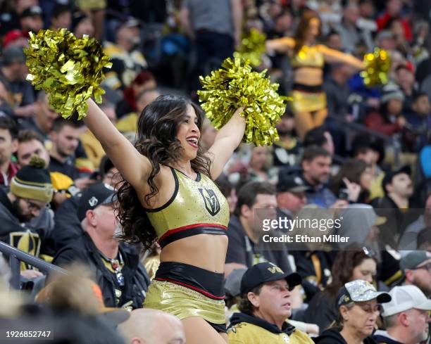 Member of the Vegas Golden Knights Vegas Vivas cheerleaders cheers in the stands before the team's game against the Boston Bruins at T-Mobile Arena...