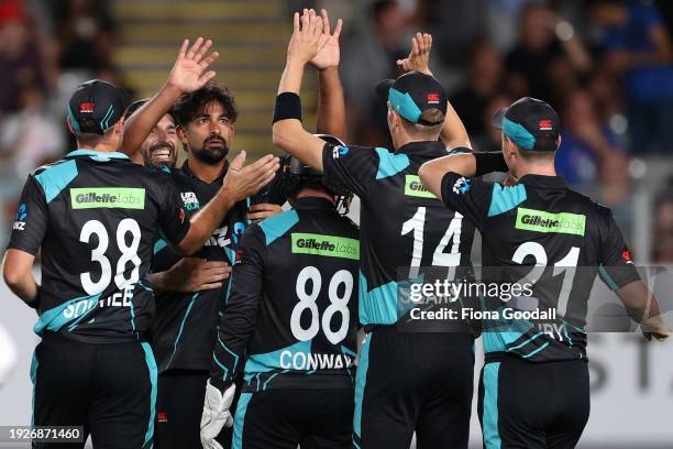 Ish Sodhi of New Zealand takes a wicket during game one of the Twenty20 series between New Zealand and Pakistan at Eden Park on January 12, 2024 in...