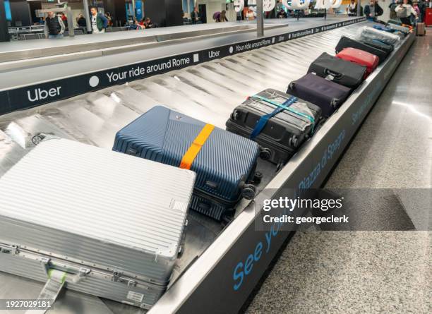 airport baggage carousel - carousel stock pictures, royalty-free photos & images
