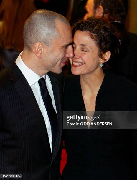 British actor Daniel Day-Lewis and his wife Rebecca arrives for the Bafta Awards at London's Leicester square Odeon cinema 23 February 2003. Lewis...